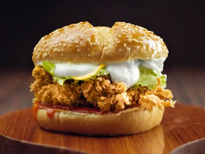 Crispy chicken sandwich topped with creamy ranch